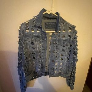 The limited jean jacket with handmade distressed squares.